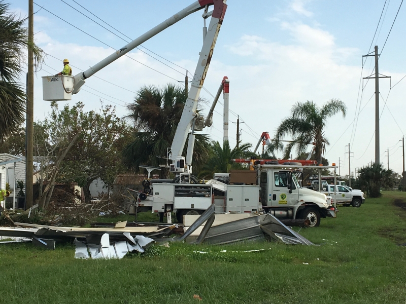 New River Electrical Storm Restoration crews in Florida repairing hurricane damage to overhead powerlines.