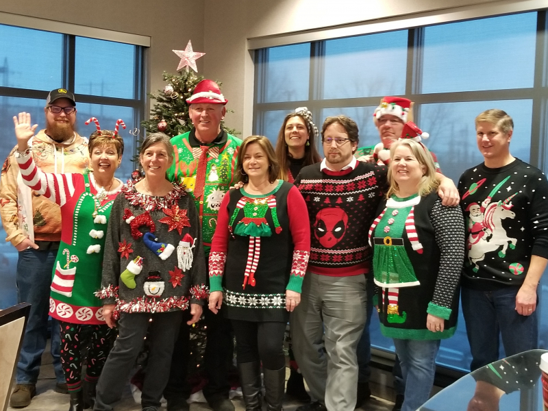New River Employees at our annual ugly sweater Christmas party.