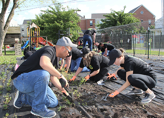 New River Electrical employees giving back to the community by planting a garden at the Ronald McDonald House in Central Ohio.