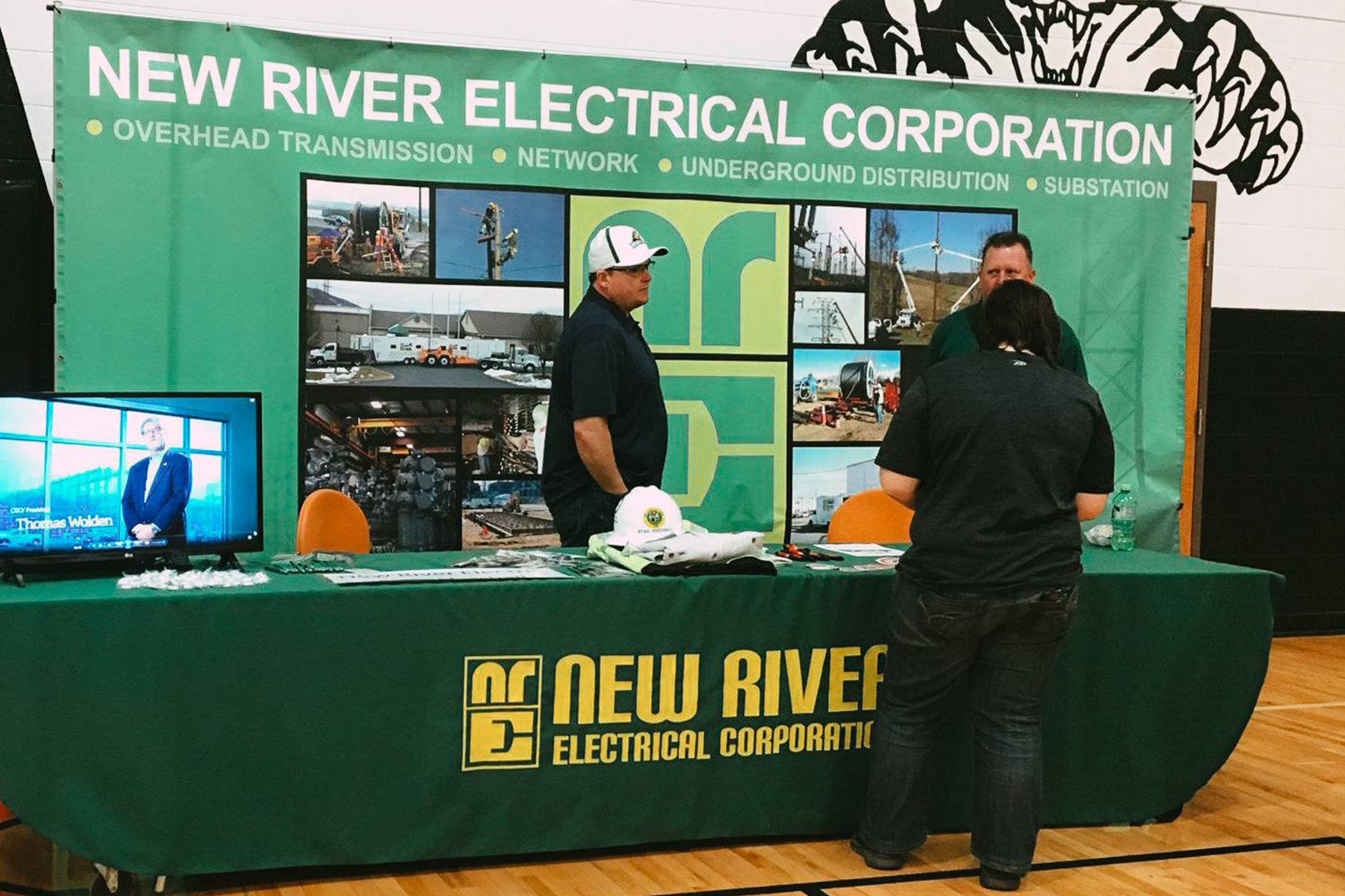 New River Electrical employees at a career fair at a local school.