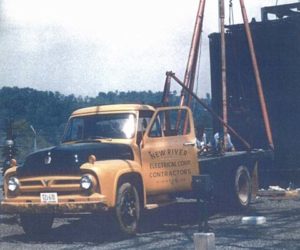 New River Electrical's first yellow crane truck.