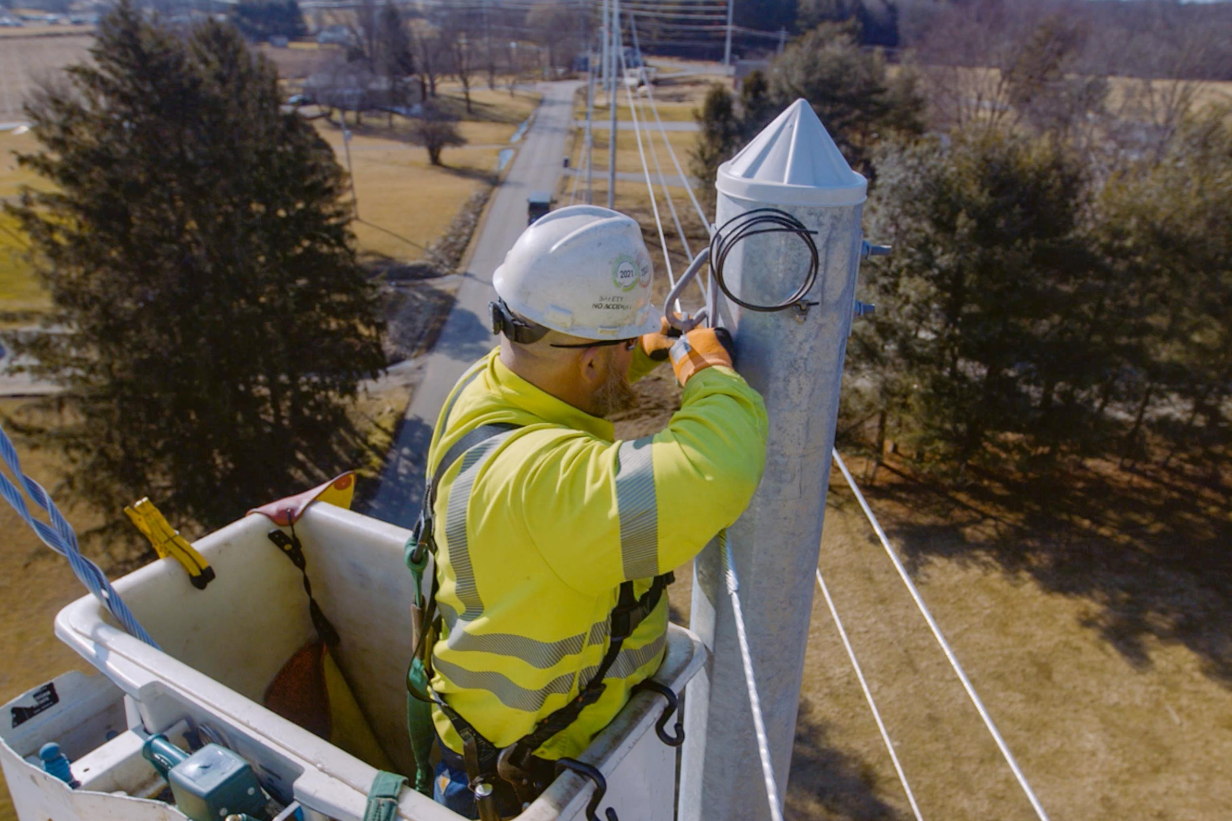 NRE worker working on powerlines