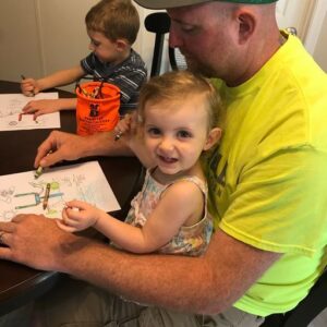 NRE Dad and kids drawing