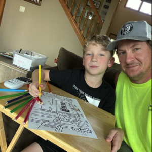 NRE Dad coloring with son